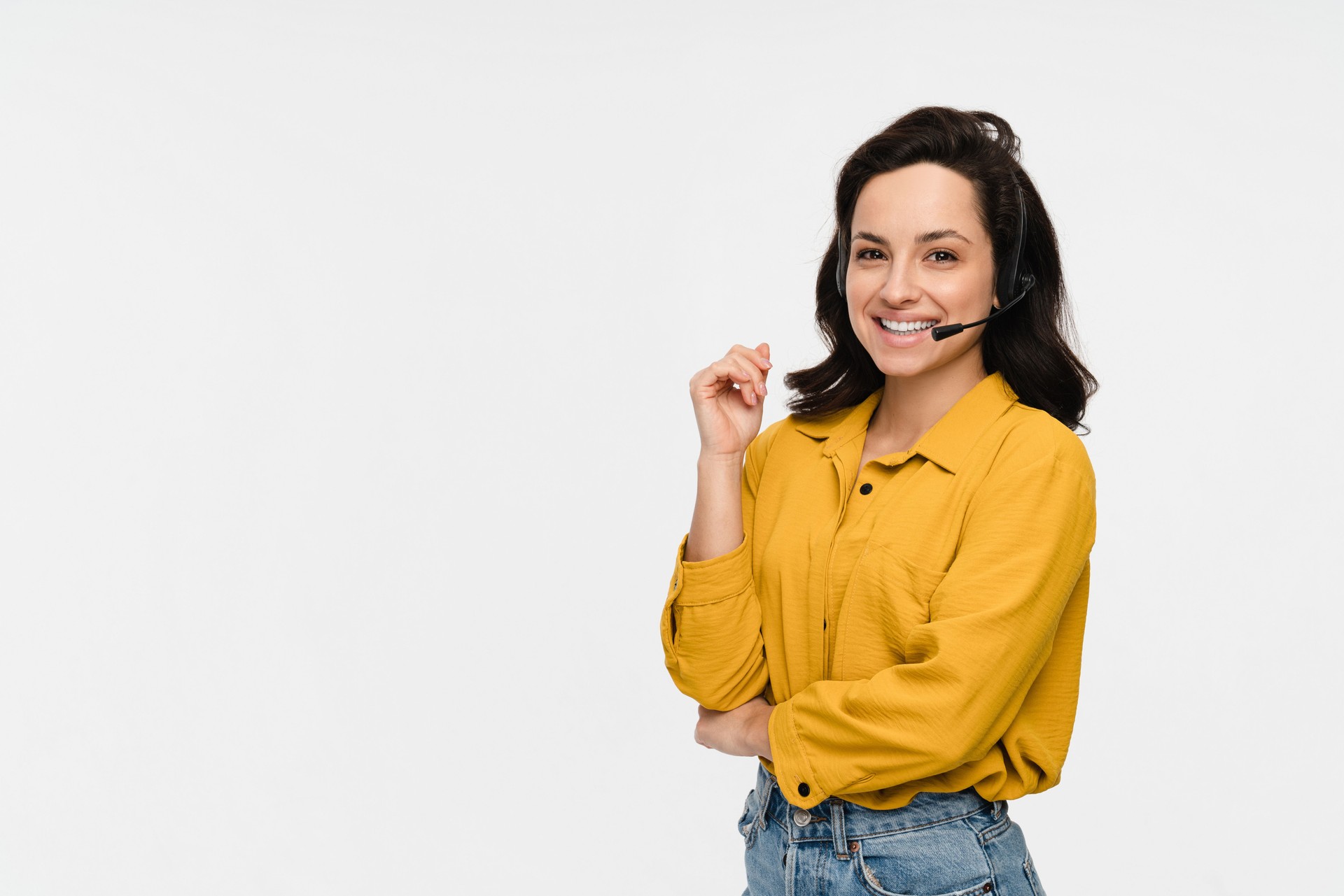 Young woman hotline operator worker with headset isolated on white background. Call center concept